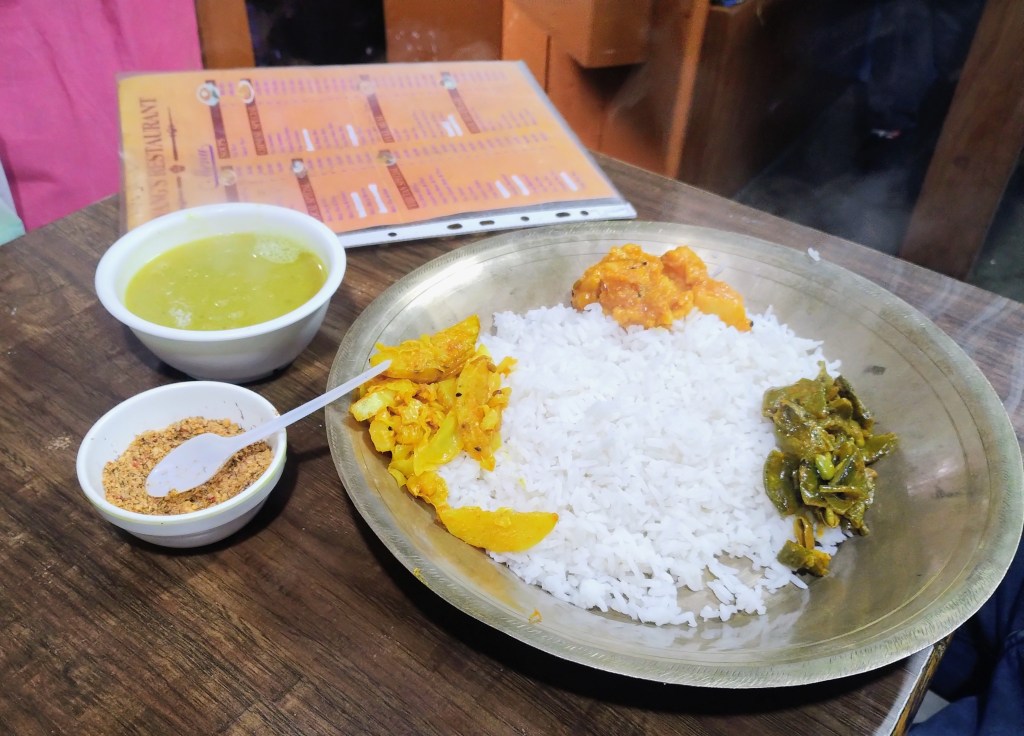 Nepali thali meal with rice, dal and sabzi at Nawangs Darjeeling